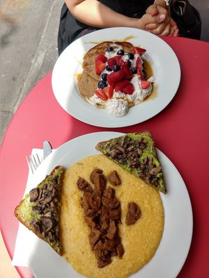 Pancakes and Polenta with sausage and mushroom avocado toast at Greedi Vegan - Bergen St in Brooklyn