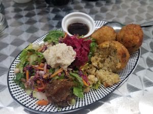 Vada balls with salad and sauerkraut at Health Healing & Harmony in Innisfail