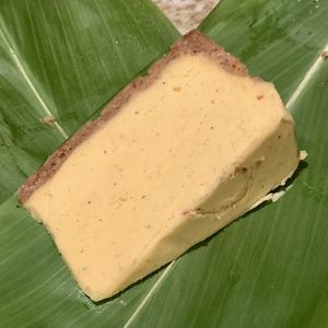 Lilikoi “cheesecake” wrapped in a leaf, to go    at Moku Roots in Kula