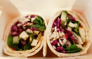 Marinated crispy tofu wrap with sweet chilli sauce red cabbage cucumber and spring onion.

Not a daily item as we change our sandwich and wrap selections.. at The Garden Cafe and Takeaway in Kendal