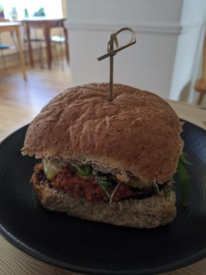 Tastiest smokey vegan black bean & sunflower seed burger to date! at The Garden Cafe and Takeaway in Kendal