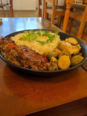 Lentil loaf...perfect winter warmer. Really flavoursome loaf.. Loved the garlic 'buttered' sprouts yum yum!! at The Garden Cafe and Takeaway in Kendal