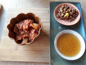 Side dishes: kimchi and fermented soy beans at Ka Vegan Udon & Sushi in Krakow