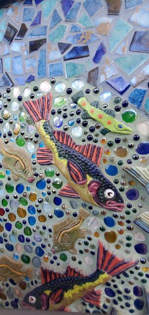 Artful outdoor patio seating area at Delta Of Venus in Davis