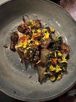 Sunchokes- such a great dish with edible flowers and amazing culinary combination of flavors  at Sorghum & Salt in Charleston