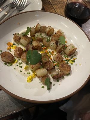 Potato Gnocci- Seared to a perfect golden brown- was absolutely delicious. We were getting full but could not stop eating the entire dish because it was so amazing!!!  at Sorghum & Salt in Charleston