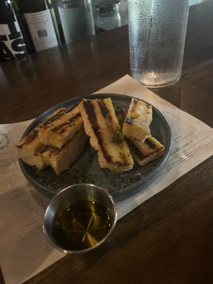 Side of bread w/ olive oil  at Sorghum & Salt in Charleston