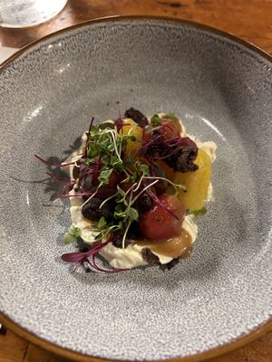 Cherry tomatoes with whipped tofu and fried olives- this was incredible  at Sorghum & Salt in Charleston