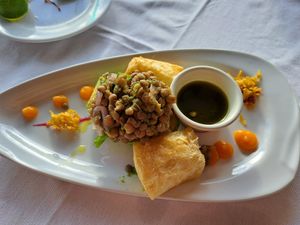 Vegan ceviche (lentils over an avocado half) with fried yucca and a basil mint sauce at La Luna in Manuel Antonio