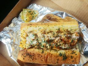 Spicy "crab" po'boy at Mora Pizza in Miami