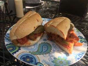 Vegan sausage sandwich with a juicy peppers in a marinara sauce.  at Carmine's Italian Deli in Elmsford