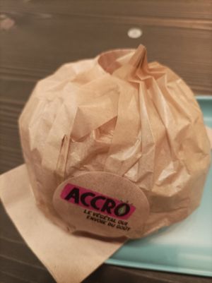 Beautifully wrapped burger at Hank Cuisine Végétale - Rochechouart in Paris