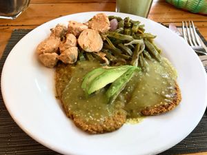 Milanesa de lentejas con dos ensaladas. Nopales y patatas at Origenes Organicos - Hipodromo Condesa in Mexico City