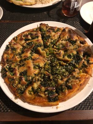 Vegan pizza with cashew cheese at Pumpernickel Bakery and Babylon Cafe in Pokhara