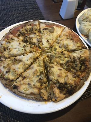 Buckwheat gluten free vegan pizza at Pumpernickel Bakery and Babylon Cafe in Pokhara