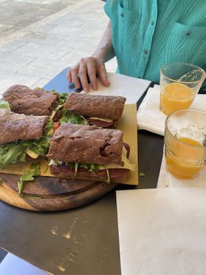Two of their vegan sandwiches with fresh-squeezed orange juice   at Duecento Gradi in Rome