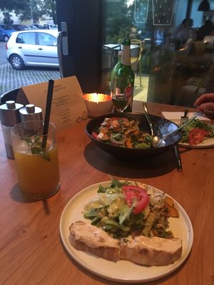 Mixed salad with hokkaido, quinoa, tofu and flatbread with delicious hummus  at Uno Rajh in Murska Sobota