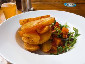 Tagine with chips instead of cous cous and Gladiator cider. at The Market Pub in Chesterfield