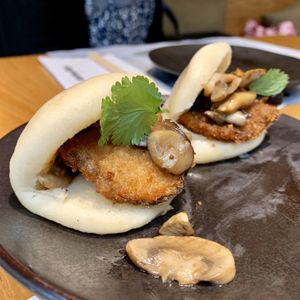 Mixed mushrooms and panko aubergine hirata steamed buns at  Wagamama - Hammersmith in West London
