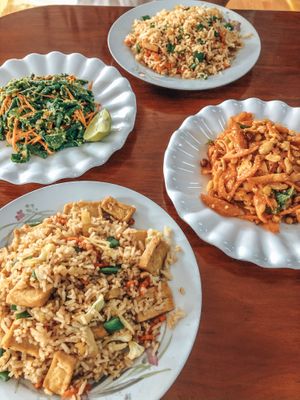 Fried rice with tofu (upon request), tomato salad (with peanuts and garlic) and green bean salad at Marie Min in Mandalay