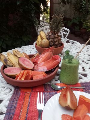 tropical breakfast on the patio at Hostal Patio de 27 in Havana