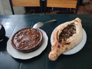 To the right the mushroom amazing pie! To the left so thing that I don't remember which was OK. at Kazbegi Good Food in Stepantsminda