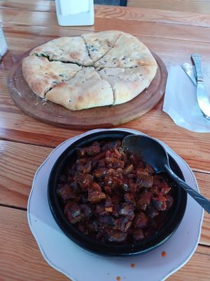 Mushroom ostri (so good), and spinach bread at Kazbegi Good Food in Stepantsminda