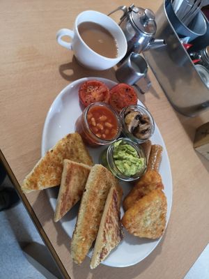 They offered to replace one potato scone with a soda farl so I could try it. at Causeway Cafe in Belfast