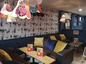 Inside the Cafe they have comfy sofas as well as tables at Causeway Cafe in Belfast