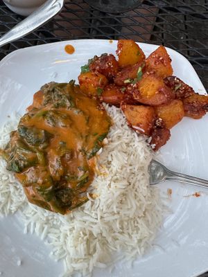 I'm sorry this photo isn't better, but it shows the excellent coconut spinach with tofu and the chiya chili potatoes, both vegan. at Namaste Cafe in Minneapolis