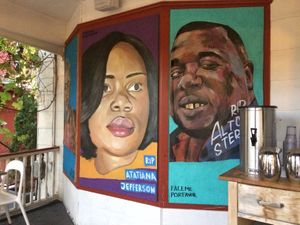 Beautiful murals at outside eating area.  at Namaste Cafe in Minneapolis