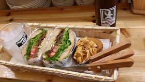 This was so delicious! We ordered the set meal with the bulgogi burger and the home made cola. It also came with two small pancakes.  at No Meat Burger Health in Busan