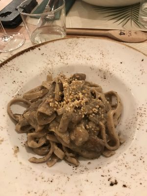 Vegan tagliatelle with hazelnut cream, mushrooms and truffle at Bio's Kitchen in Bologna
