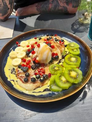 Pancakes with fruits,dates syrup and icecream at Vegetus in Cheltenham