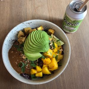 Delicious noodle dish (Knivsöder) with tofu, mango, avocado and a peanut sauce. Yummy apple kombucha! at Mahalo  - Odengatan in Stockholm