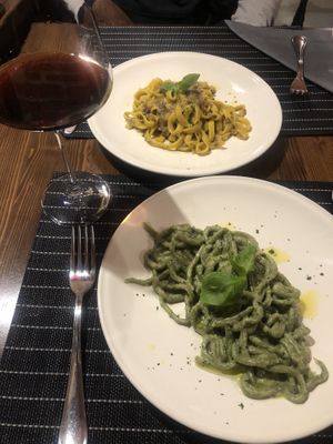 Spinach pesto pasta , fungi pasta, red wine   at Ciriera Osteria Vegan in Trequanda