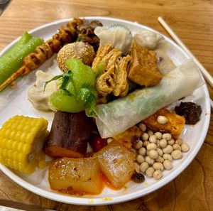 Duck pancake, seitan skewers, tofy, rice balls, dumplings, veggies at SUHU 素虎 - Qianmen in Beijing