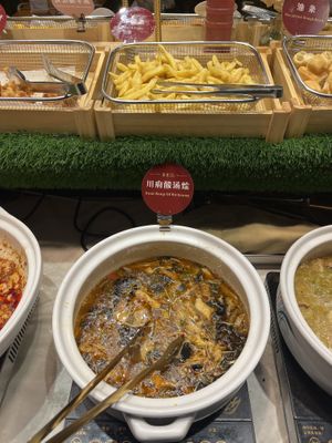 soup boiling on the stoves  at SUHU 素虎 - Qianmen in Beijing