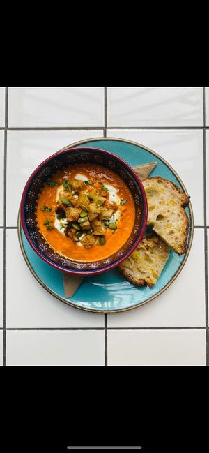 Beautiful seasonal soup red pepper with vegan créeme fraiche at Cliffs in Margate