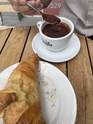 Hot chocolate and plain croissant   at Dolce & Vegana in Madrid