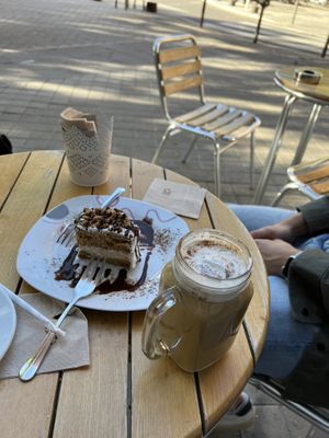 Cake and pumpkin spice latte  at Dolce & Vegana in Madrid