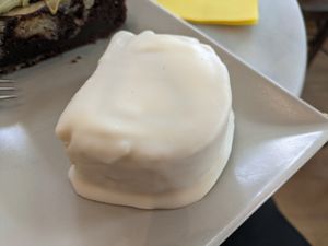 White chocolate with whipped cream at Dolce & Vegana in Madrid