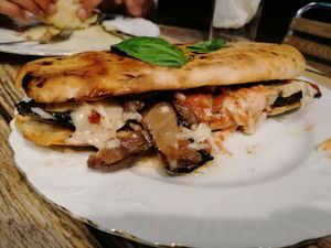 Panuozzo melanzane parmigiana at Dolce & Vegana in Madrid