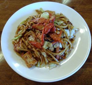 Dark sauce-fried Udon w/ sliced vegetables, tofu & soy protein for $16 at Water Drop Vegetarian Cafe in Christchurch