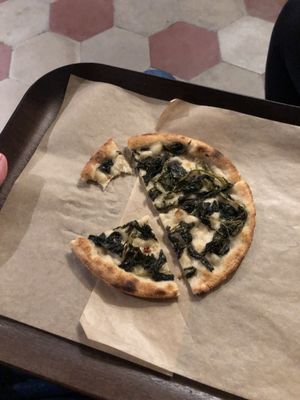 Plain oil and salt pizza with added spinach at Trieste Pizza in Rome