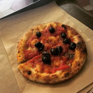 pizza marinara with olives at Trieste Pizza in Rome