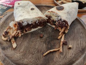 Mushroom burrito with vegan cheese at Pizza Luna / Tito's Burritos in Koh Phangan