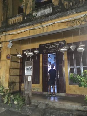 Need to walk through front of shop to get to cafe at Mama Vegetarian Cafe in Hoi An