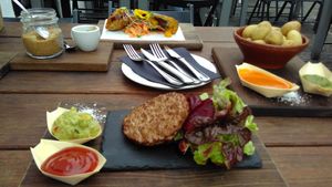 Tacos, Canarian potatoes and (Linda McCartney) burger with salad / dip. at Cantina Teguise in Lanzarote