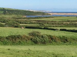 Views of rolling hills with Portland in the distance at Tidmoor Farm in Chickerell